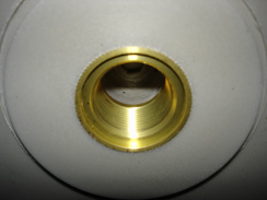 Example of a female screw insert used in piping.